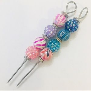 2 Scribe tools for cookie decorating.